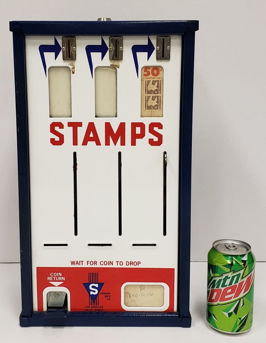 50 cent Stamp Machine: 10"w x 5.5"d x 17"h Porcelain front stamp machine in excellent condition with minor scuffs. PLEASE READ & UNDERSTAND THE PAYMENT & SHIPPING TERMS FOR THIS AUCTION PRIOR TO PLACING BIDS.