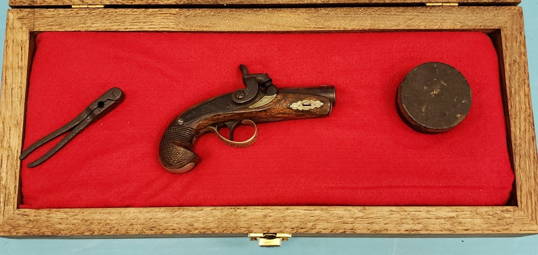 1850's Derringer Pocket Gun: This is the same style gun used to Assassinate Abraham Lincoln. The 1850's gun comes with a handsome glass covered case and accessories to make an attractive display. READ AND UNDERSTAND THE PAYMENT &