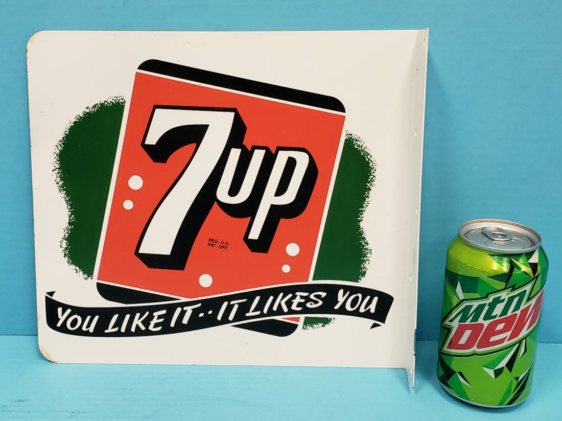 7up Flange Sign: 11" x 10" flange sign in excellent condition with bright colors, high gloss, and a couple minor paint flakes on one side. Made by the Stout Sign Co. PLEASE READ & UNDERSTAND THE PAYMENT & SHIPPING TER