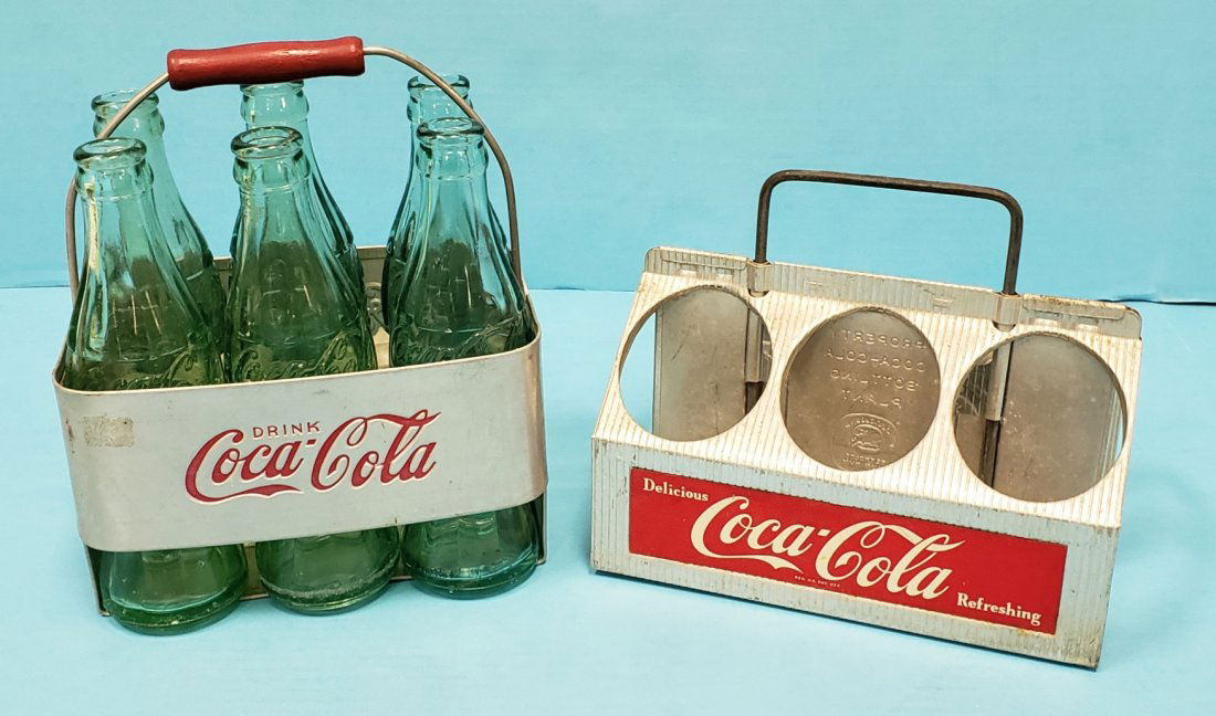 2 Aluminum Coca Cola Carriers with 6 Bottles: 2 Original carriers with 6 vintage bottles. One of the carriers has the logo stamped in the aluminum. Excellent original condition. PLEASE READ & UNDERSTAND THE PAYMENT & SHIPPING TERMS FOR THIS AUCTI
