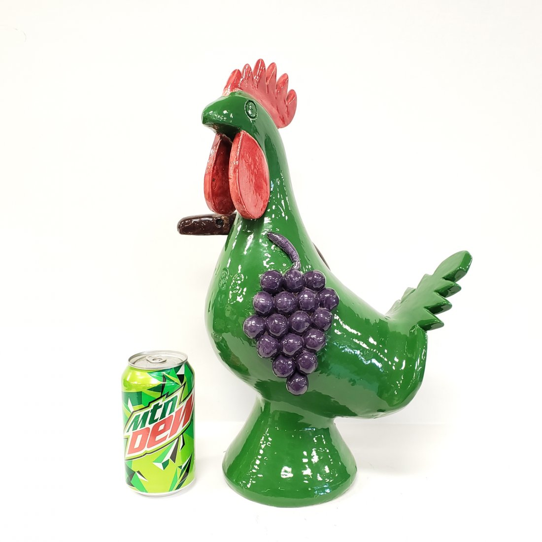 Edwin Meaders Nubs #1 Green Rooster w/ Grapes & Snake: 15" Green rooster with purple grapes and brown snake. Nubs #1 incised on the breast. Excellent condition with bright colors. Incised Edwin Meaders and dated 2010 on the bottom. Excellent condition wit
