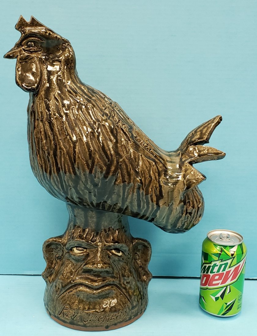 1993 Cleater Meaders Rev. Jughead Face Jug Pottery: 17"h glazed and incised Cleater Meaders on the top and Rev. Jughead-1993 on the front. PLEASE READ & UNDERSTAND THE PAYMENT & SHIPPING TERMS FOR THIS AUCTION PRIOR TO PLACING BIDS.