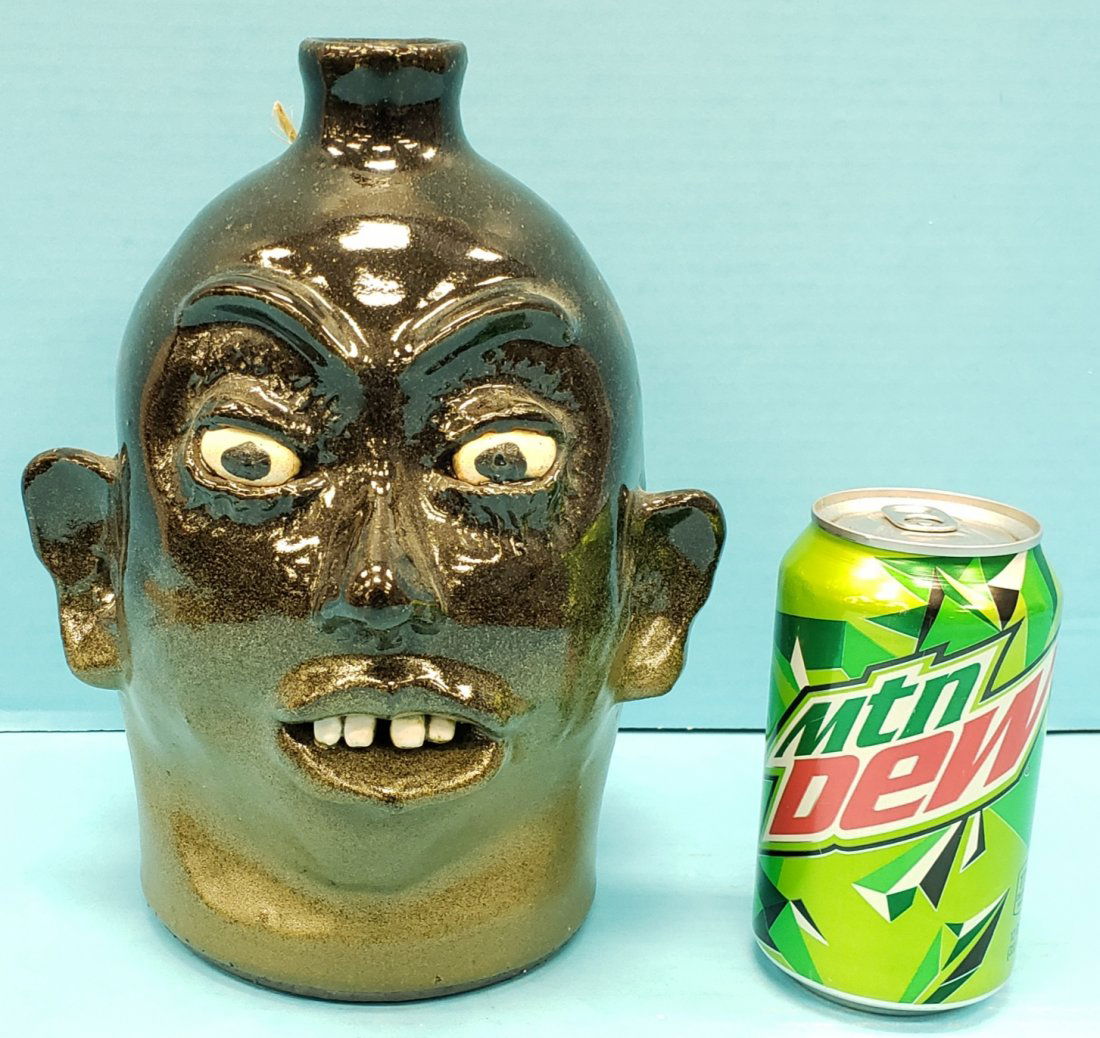 Lanier Meaders Rock Tooth Face Jug: 9"h face jug in excellent condition incised Lanier Meaders on the bottom. PLEASE READ & UNDERSTAND THE PAYMENT & SHIPPING TERMS FOR THIS AUCTION PRIOR TO PLACING BIDS.