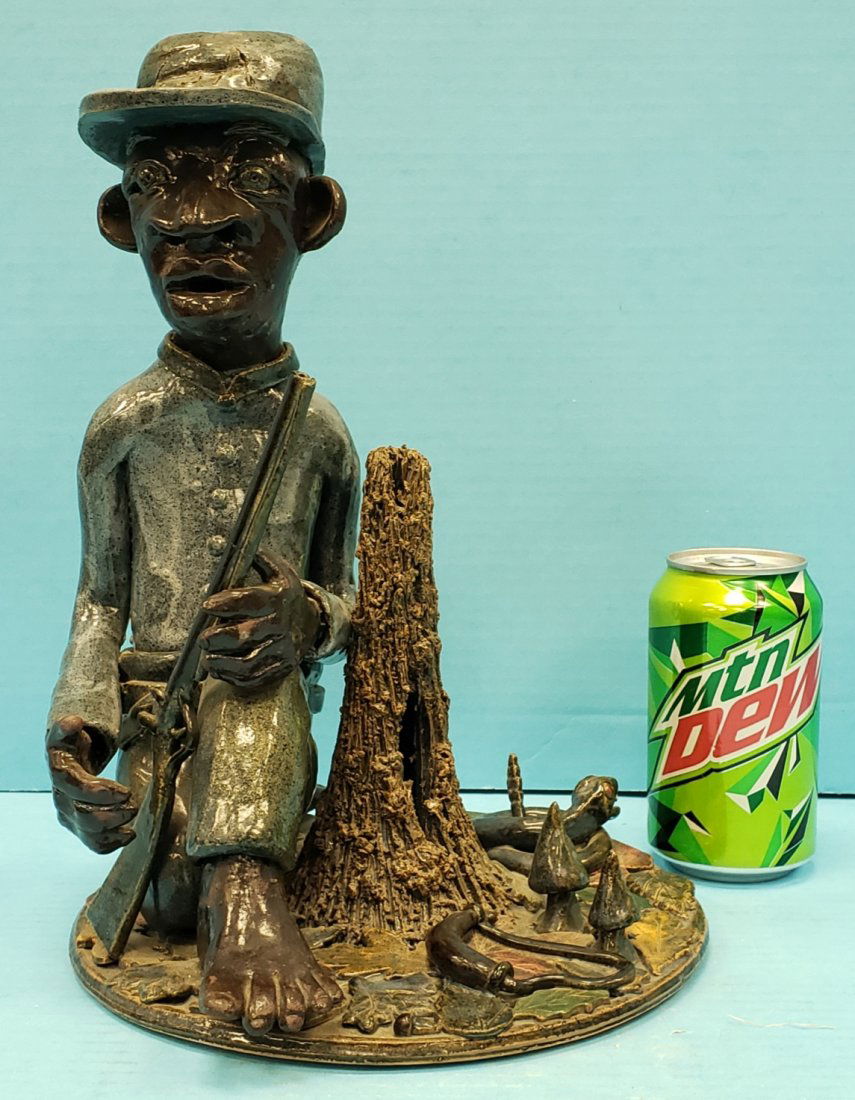 Lin Craven Confederate Soldier Scene Pottery: 12"h detailed soldier with gun, powder horn, rattlesnake, leaves on the ground, and tree stump. The gun barrel has a repair above the hand. Signed, dated 1999, numbered #8. PLEASE READ & UNDERSTAND TH