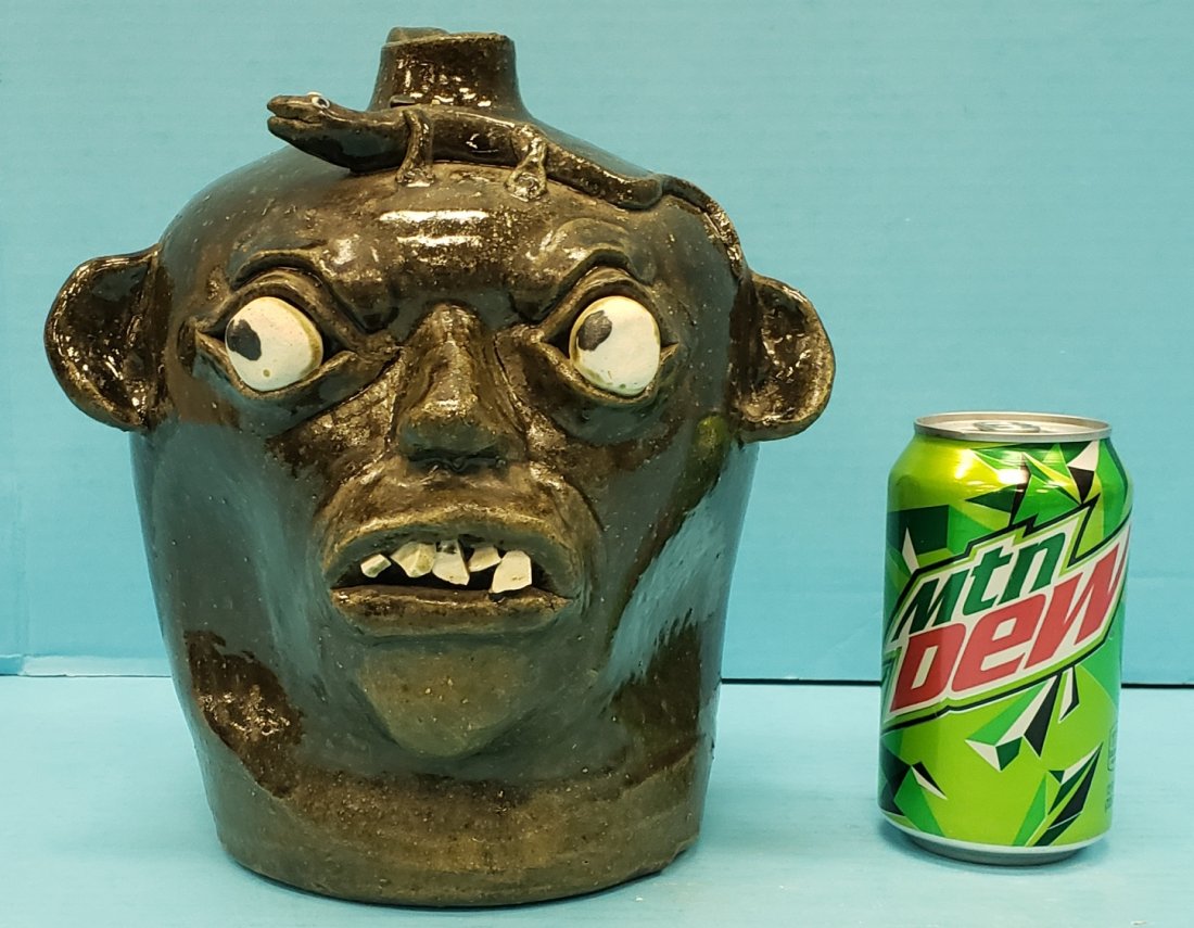 1985 Chester Hewell Face Jug with Lizard: 9.5" Glazed face jug with china teeth in excellent condition. Signed 'For Ken Lamb 4-20 85 Chester Hewell' PLEASE READ & UNDERSTAND THE PAYMENT & SHIPPING TERMS FOR THIS AUCTION PRIOR TO PLACING BIDS.