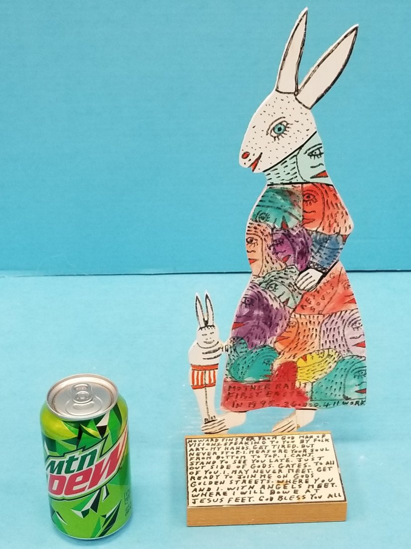 Howard Finster Mother Rabbit First Easter: Reverend Howard Finster #36,411 Signed and dated 1995. 6.5" x 15.5" painted cutout plywood with the Reverend's prayer inscription on the base and hand written message on the back. PLEASE READ & UNDERS