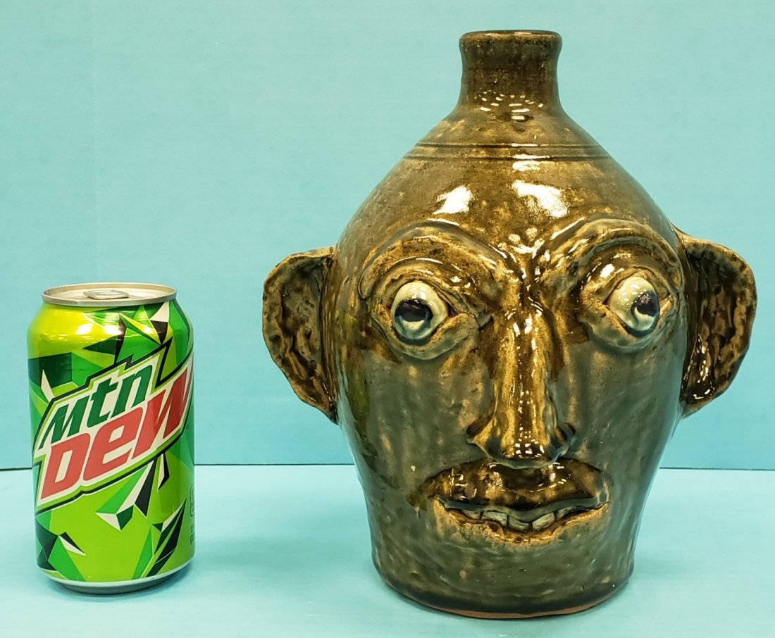 John Meaders #4 Face Jug: 9" Glazed low number #4 face jug in excellent condition. Signed and numbered on the bottom. PLEASE READ & UNDERSTAND THE PAYMENT & SHIPPING TERMS FOR THIS AUCTION PRIOR TO PLACING BIDS.