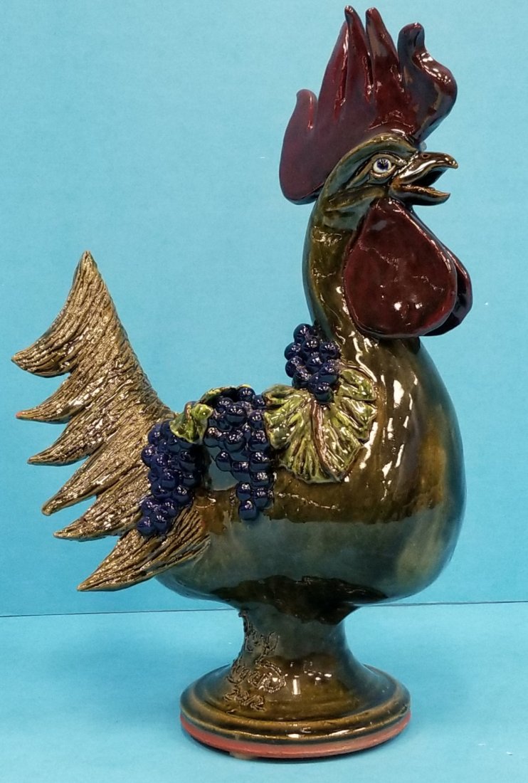 Rex Hogan Grapevine Rooster Planter: 15.5"h. Rich colorful glaze with grapevine theme. Has small chip on one tail feather and another small repair on another tail feather. See pictures. Incised Rex Hogan 2012. PLEASE READ & UNDERSTAND TH
