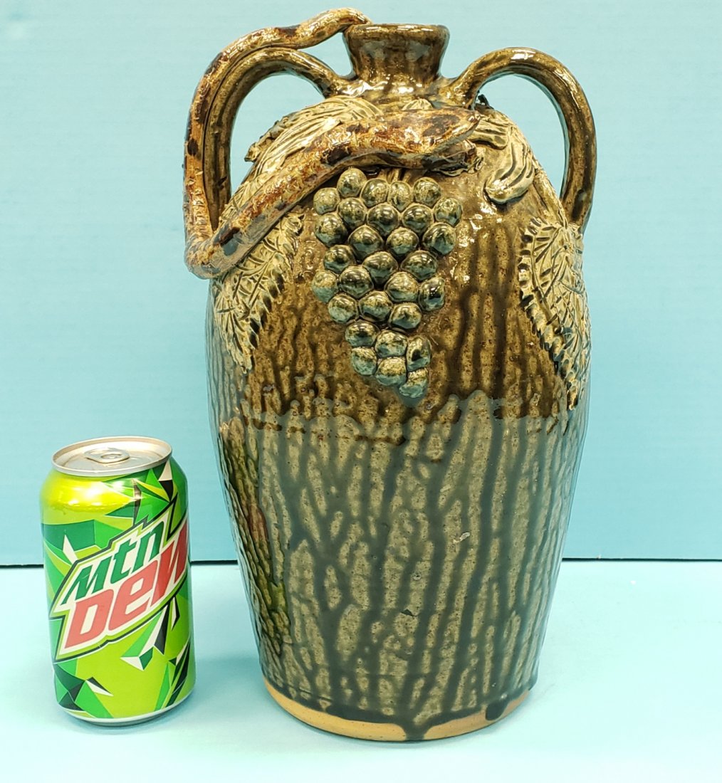 Cleater & Billie Meaders Double Handled Jug w/ Snake: 12.5" Beautifully Glazed double handle jug with grapes, snake, and vines. Excellent condition. Signed and dated 1-26-1993. PLEASE READ & UNDERSTAND THE PAYMENT & SHIPPING TERMS FOR THIS AUCTION PRIOR 