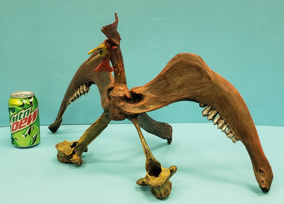 Bone Folk Art Sculpture by R. A. T.: 22" x 12.5" Prehistoric bird made of bone by folk artist Robert A. Thurston R.A.T. Excellent condition. PLEASE READ & UNDERSTAND THE PAYMENT & SHIPPING TERMS FOR THIS AUCTION PRIOR TO PLACING BIDS.
