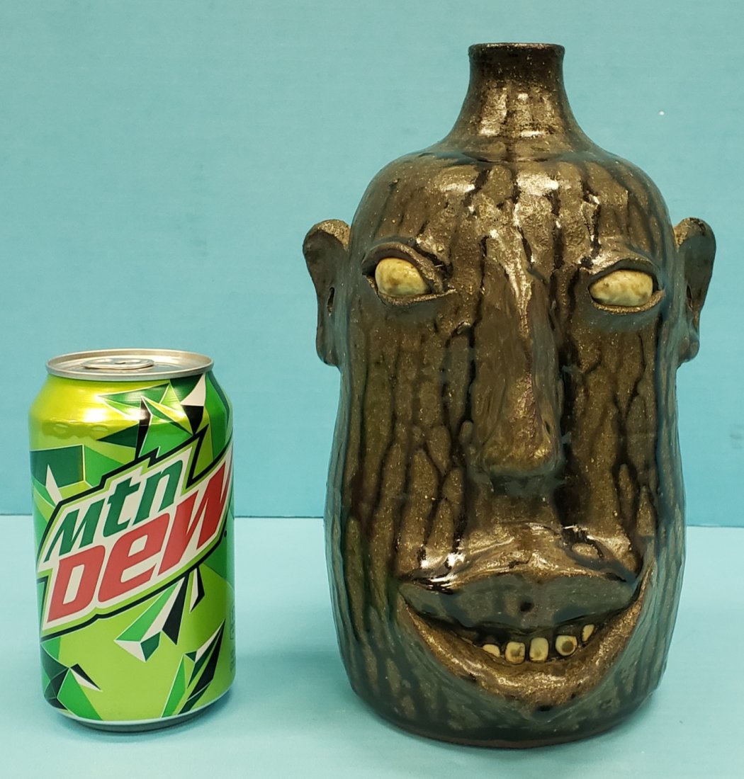 David Meaders Face Jug 1892-1993 Meaders Day: 9.25"h Glazed tooth face jug signed and dated 9-18-93. Excellent condition. PLEASE READ & UNDERSTAND THE PAYMENT & SHIPPING TERMS FOR THIS AUCTION PRIOR TO PLACING BIDS.
