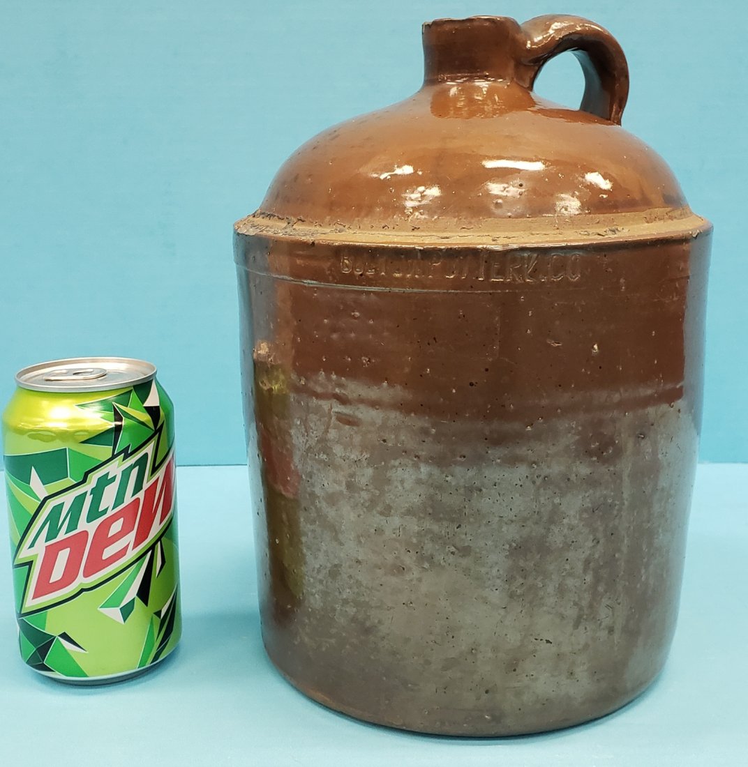 Bolton Pottery Co. Jug: 10.5" Glazed jug with some chips at the rim. Stamped BOLTON POTTERY CO. PLEASE READ & UNDERSTAND THE PAYMENT & SHIPPING TERMS FOR THIS AUCTION PRIOR TO PLACING BIDS.