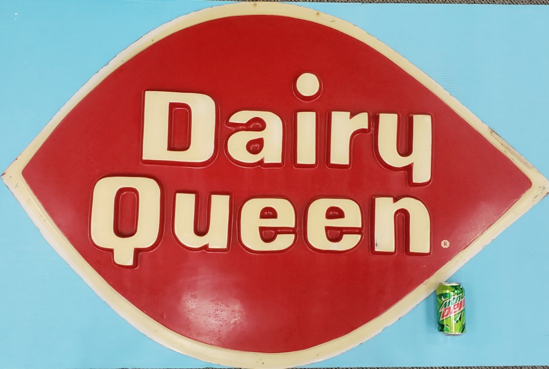 Embossed Dairy Queen sign: 55" x 36" embossed plastic sign with bright color and minor scuffs. PLEASE READ AND UNDERSTAND THE PAYMENT AND SHIPPING TERMS FOR THIS AUCTION PRIOR TO PLACING BIDS. ALL BIDDERS ARE BOUND TO THE TERMS