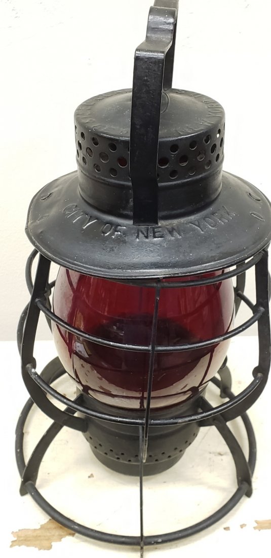 New York City Railroad Lantern: Old lantern with red embossed New York on the lens and embossed New York City on top. Excellent condition with minor scuffs or scratches. PLEASE READ AND UNDERSTAND THE PAYMENT AND SHIPPING TERMS FOR 