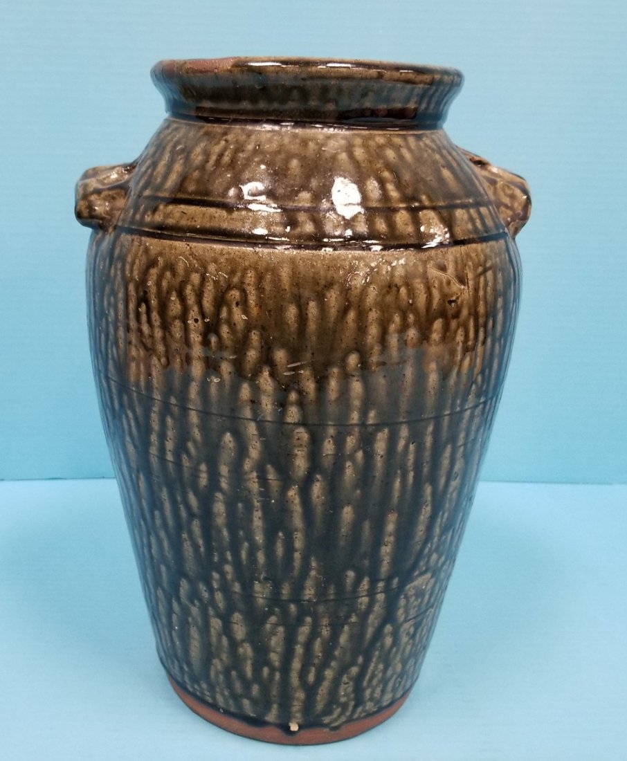 Clete Meaders Churn 1994 folk pottery: 14" glazed churn signed Clete Meaders 1994 under the handle and 50.00 under the other handle. PLEASE READ AND UNDERSTAND THE PAYMENT AND SHIPPING TERMS FOR THIS AUCTION PRIOR TO PLACING BIDS. ALL BIDD