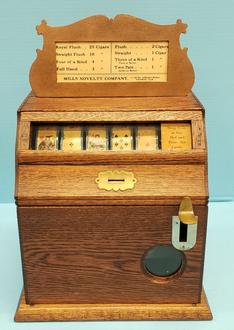 5 Cent Mills Novelty Little Perfection Trade Stimulator: 5 cent Mills Flat Top poker 5 reel countertop Trade Stimulator circa 1920's Restored oak cabinet with top sign. Paid out in cigars. PLEASE READ & UNDERSTAND THE PAYMENT & SHIPPING TERMS FOR THIS AUCTI