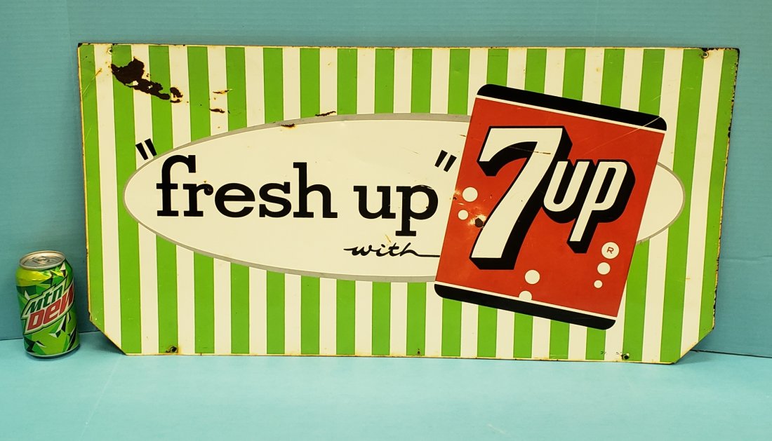 Fresh Up with 7up tin sign: 30" x 15" tin sign with bright colors, scuffs, scratches, some paint loss, and both bottom corners cut off. PLEASE READ AND UNDERSTAND THE PAYMENT AND SHIPPING TERMS FOR THIS AUCTION PRIOR TO PLACING