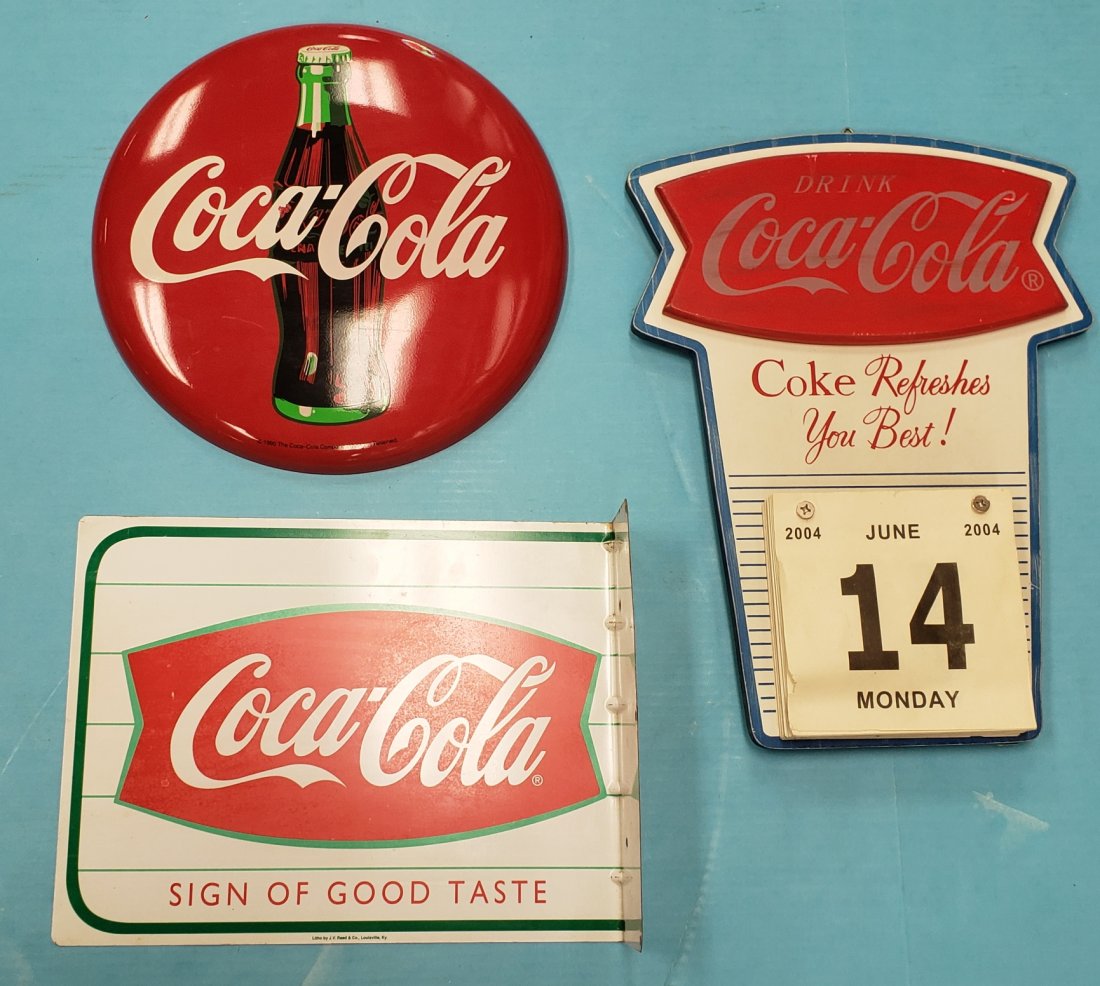 Coca Cola Button, Fishtail calendar, & Flange Sign: 1990 12" Coca Cola button sign, 13" x 10" flange sign, wood fishtail Coca Cola calendar holder sign. All have bright colors & minor scuffs. PLEASE READ & UNDERSTAND THE PAYMENT & SHIPPING TERMS FOR TH