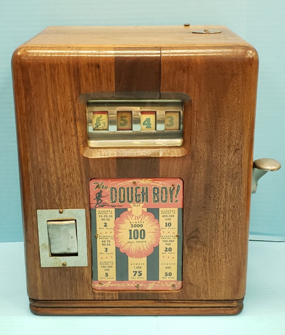 The Dough Boy Trade Stimulator: 9.5" x 7" x 12" Working 5 cent coin operated trade stimulator with gum vendor in excellent condition. Not locked no key needed.