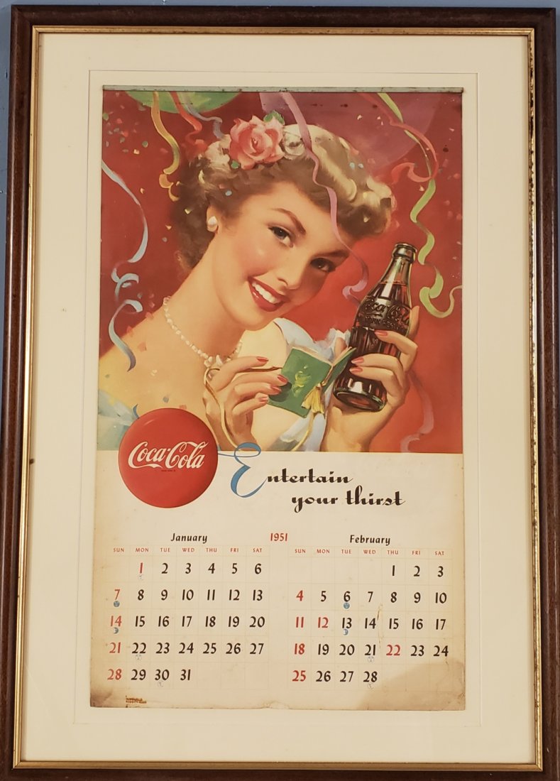 1951 Coca Cola Pinup Girl Calendar: 19.5" x 27.5" Complete framed calendar with some stains. PLEASE READ AND UNDERSTAND THE PAYMENT AND SHIPPING TERMS FOR THIS AUCTION PRIOR TO PLACING BIDS. ALL BIDDERS ARE BOUND TO THE AUCTION TERMS.