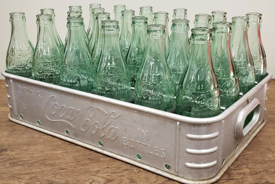 Aluminum Coca Cola Bottle Carrier & Bottles: Embossed aluminum carrier full of bottles. Excellent condition. PLEASE READ AND UNDERSTAND THE PAYMENT AND SHIPPING TERMS FOR THIS AUCTION PRIOR TO PLACING BIDS. ALL BIDDERS ARE BOUND TO THE AUCTION T