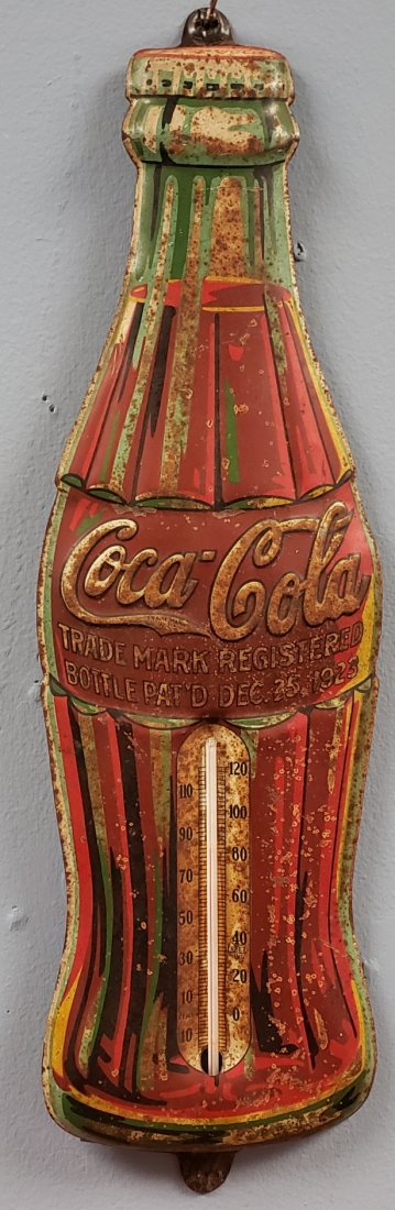 1933 Die Cut Coca Cola Christmas Bottle Thermometer: 5" x 16" Embossed tin Coca Cola Christmas bottle thermometer with Dec. 25, 1923 on the bottle and marked 33 at the bottom. Scuffs, scratches, and rust. PLEASE READ & UNDERSTAND THE PAYMENT & SHIPPING 