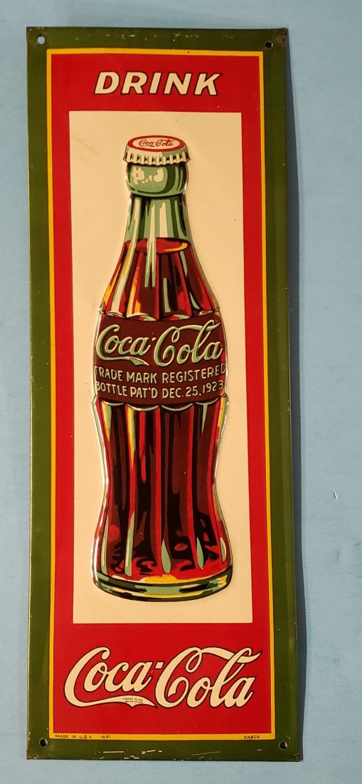 1931 Embossed Coca Cola Christmas Bottle Tin Sign: 4.5" x 12.5" Tin sign with the 1931 Christmas bottle. Excellent condition with very bright colors and high gloss. PLEASE READ & UNDERSTAND THE PAYMENT & SHIPPING TERMS FOR THIS AUCTION PRIOR TO PLACIN