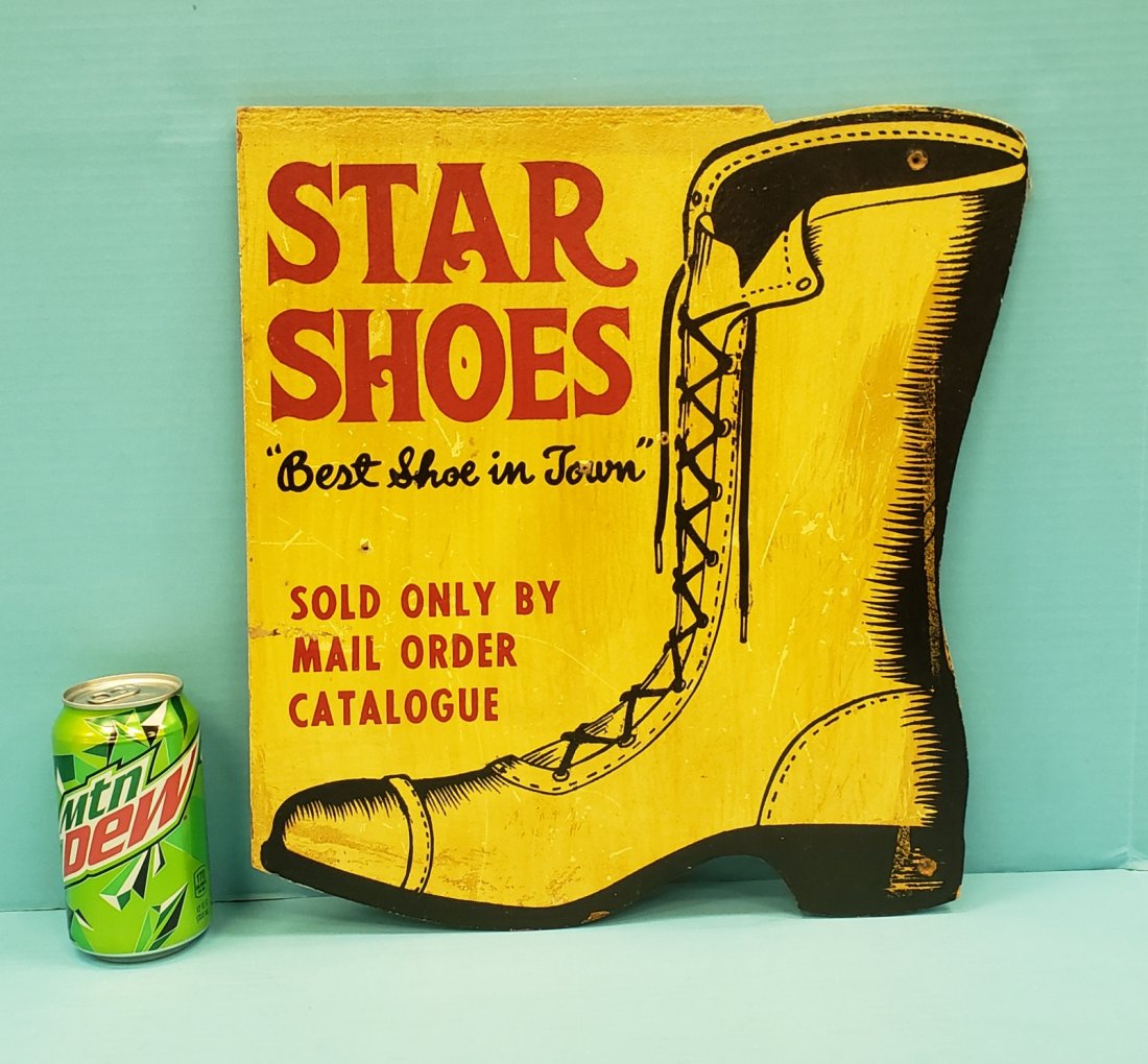 Star Shoes Masonite sign: 14.25" x 15" Masonite sign displays well with scuffs, scratches, and a few small holes. PLEASE READ & UNDERSTAND THE PAYMENT & SHIPPING TERMS FOR THIS AUCTION PRIOR TO PLACING BIDS. ALL BIDDERS ARE BO