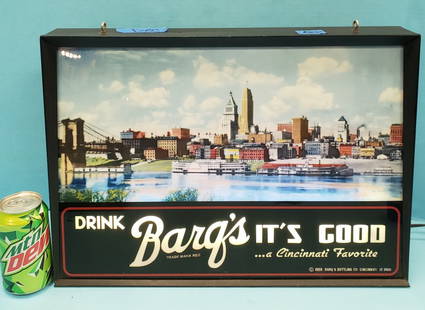 1958 Drink Barq's Cincinnati Skyline Light Up Sign: 18.5"w x 13.25"h x 4"d Countertop Motion light sign of Cincinnati OH skyline in 1958. The sign changes several colors when running. The sign has a glass face with metal housing and 1958 Barq's