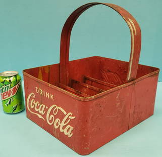 Coca Cola Metal Stadium Carrier: 10.25" x 12.25" x 12"h Original stadium carrier with Drink Coca Cola embossed on two ends. The carrier has scuffs, scratches, paint flakes and paint overspray that can be removed. PLEASE READ &