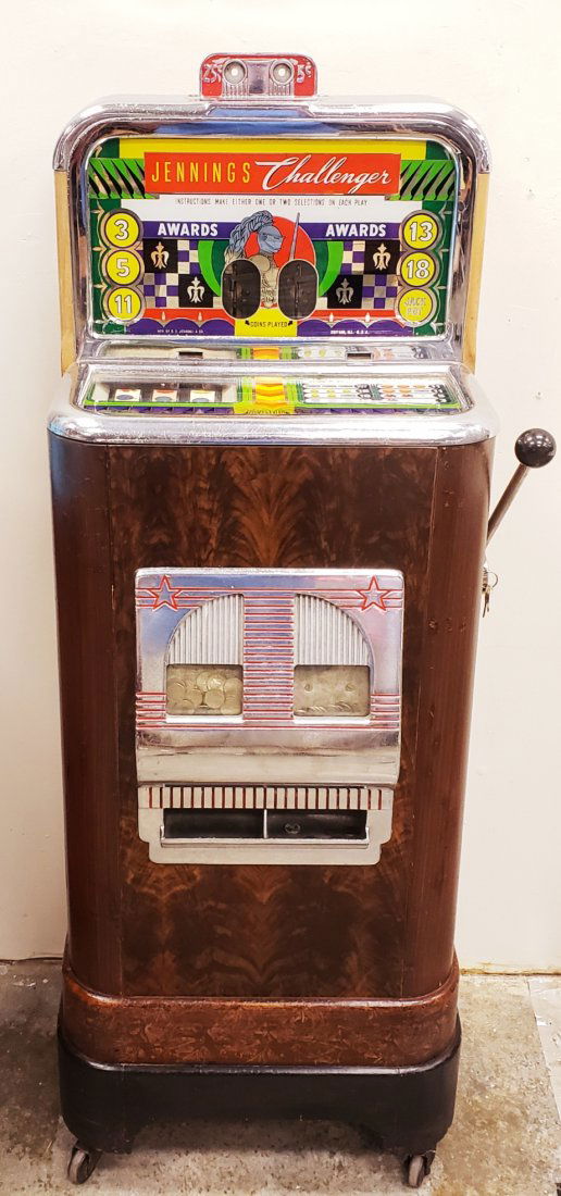Jennings 5-25 cent Challenger Floor Model Slot Machine: 21" x 16" x 58"h Dual coin slot machine on casters. Excellent working condition. PLEASE READ & UNDERSTAND THE PAYMENT & SHIPPING TERMS FOR THIS AUCTION PRIOR TO PLACING BIDS. ALL BIDDERS ARE BOUND TO
