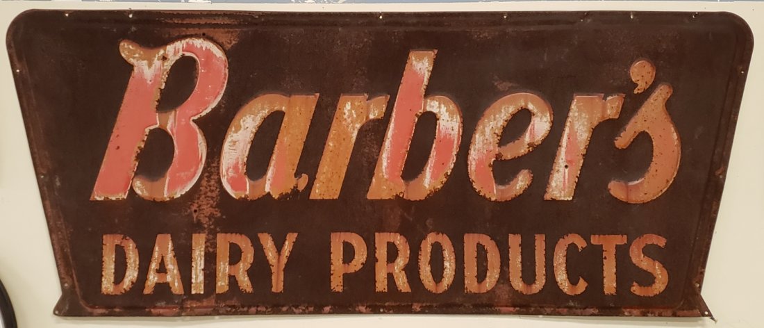 Barber's Dairy Products Embossed Sign: 70" x 29" metal sign with rust throughout and paint flakes. PLEASE READ & UNDERSTAND THE PAYMENT & SHIPPING TERMS FOR THIS AUCTION PRIOR TO BIDS. ALL BIDDERS ARE BOUND TO THE TERMS OF THIS AUCTION.