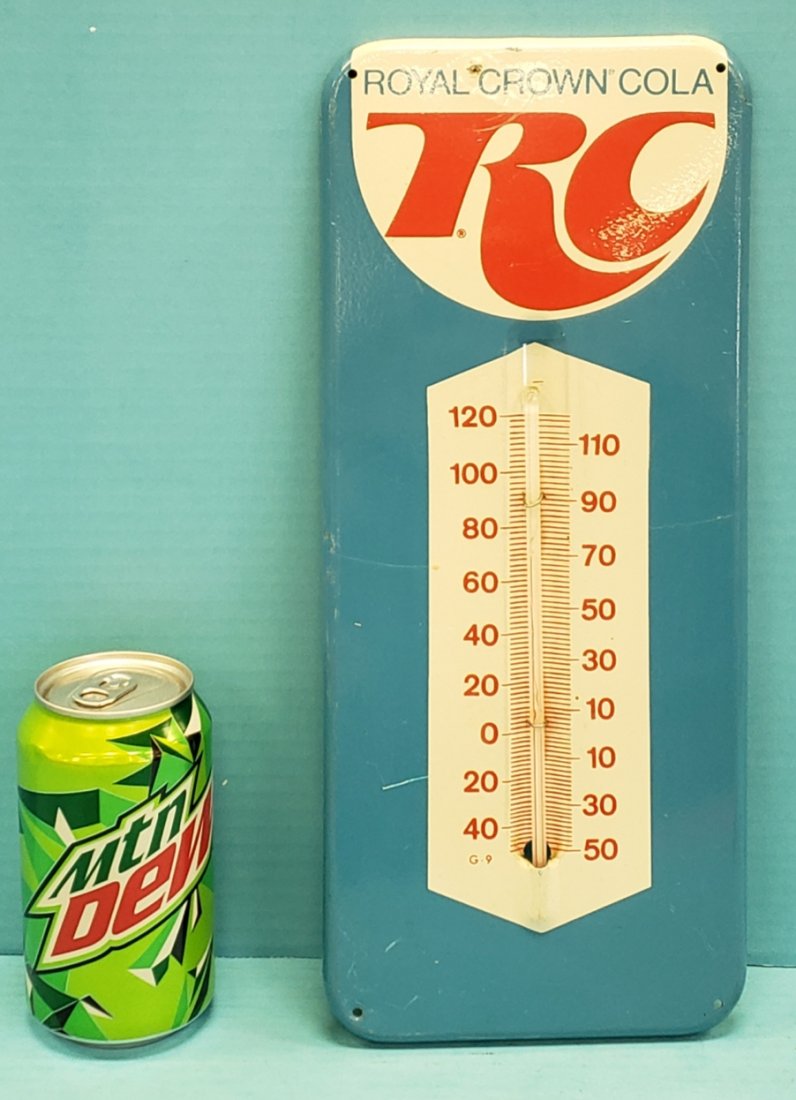 Royal Crown Cola RC Thermometer: 5.75" x 13.5" Tin thermometer with minor scuffs and scratches. PLEASE READ & UNDERSTAND THE PAYMENT & SHIPPING TERMS FOR THIS AUCTION PRIOR TO PLACING BIDS. ALL BIDDERS ARE BOUND BY THE TERMS OF THIS
