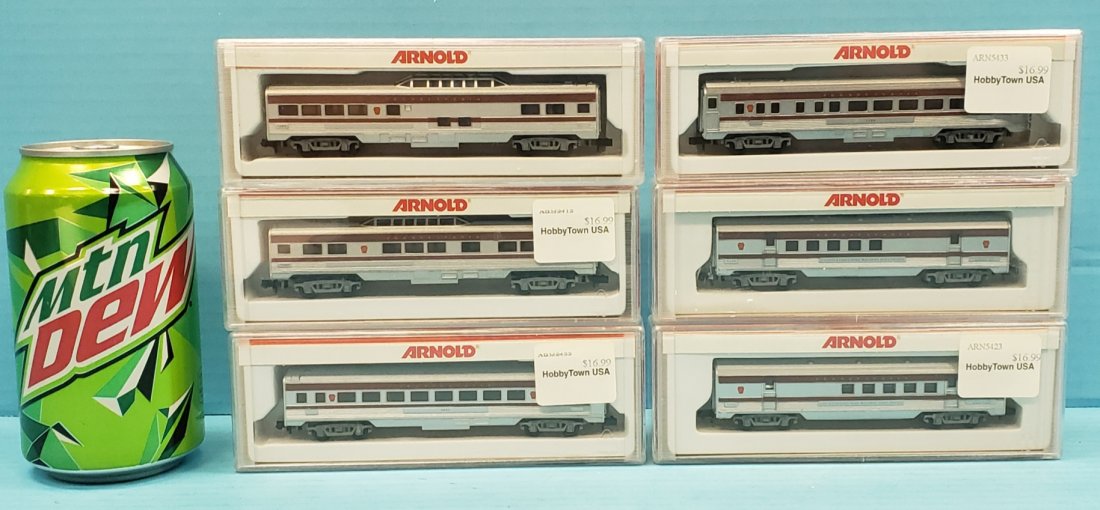Lot of 6 N-Scale Arnold Pennsylvania Railroad Cars: Six Arnold PPR cars in original boxes including: 2 Vista dome cars 7305, 2 Railway post office cars 6590, car 1122, and car 4020. All cars appear to be in excellent condition. PLEASE READ & UNDERSTAND