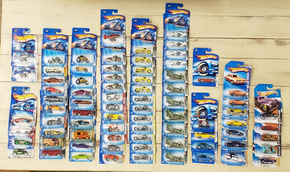 Lot of 78 Hot Wheels in original packs: 78 unopened Hot Wheels from 2003, 2004, 2005, 2006, 2009, 2010. PLEASE READ & UNDERSTAND THE PAYMENT & SHIPPING TERMS FOR THIS AUCTION PRIOR TO PLACING BIDS. ALL BIDDERS ARE BOUND TO THE TERMS OF THIS