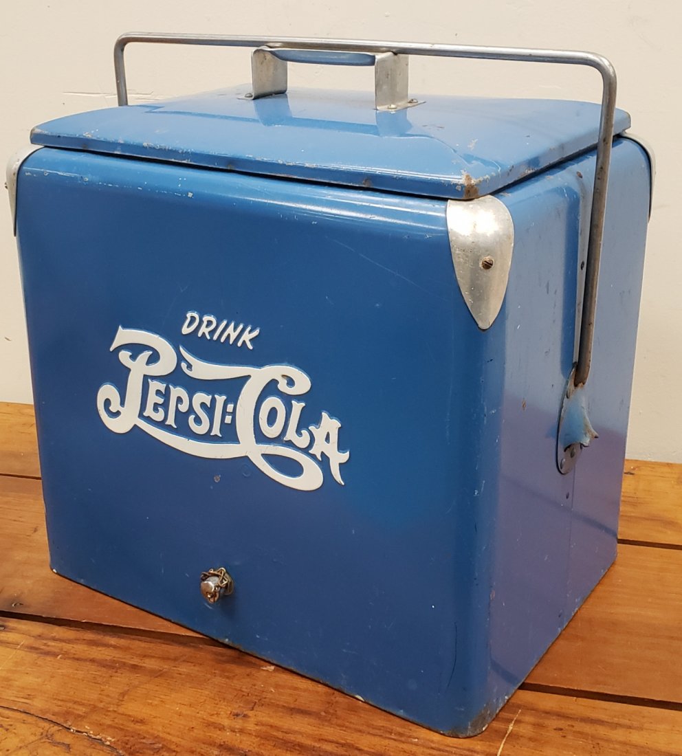 Pepsi Cola Embossed Picnic Cooler: 18" x 13" x 19"h metal cooler with built in bottle opener. Embossed on 2 sides with stains, scuffs & scratches. PLEASE READ & UNDERSTAND THE PAYMENT & SHIPPING TERMS FOR THIS AUCTION PRIOR TO PLACING