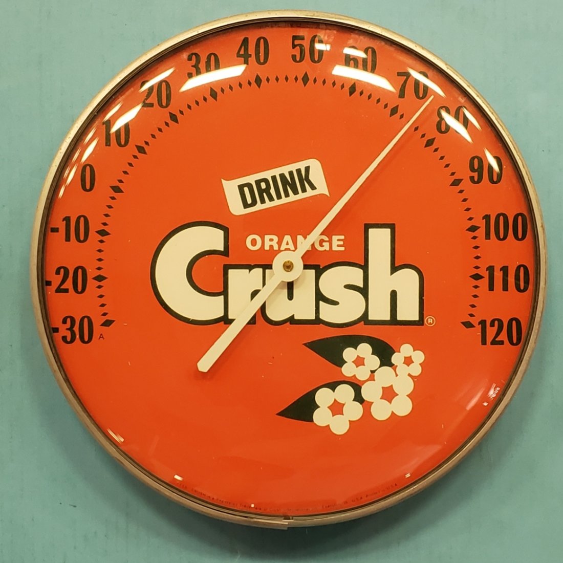 Orange Crush Round Thermometer: 12" glass face thermometer in excellent condition. PLEASE READ & UNDERSTAND THE PAYMENT & SHIPPING TERMS FOR THIS AUCTION PRIOR TO PLACING BIDS. ALL BIDDERS ARE BOUND TO THE TERMS OF THIS AUCTION.