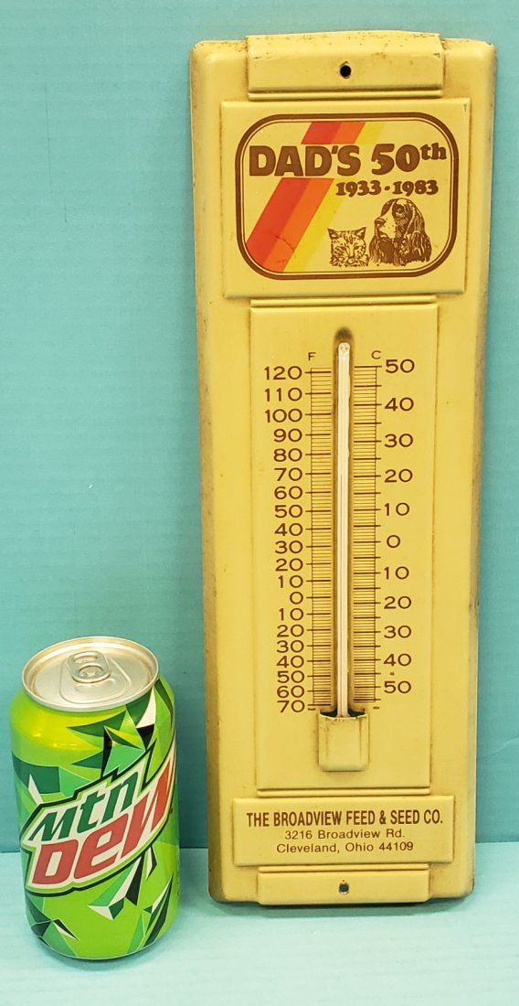 Dad's Root Beer 50th Thermometer: 4.5" x 14" tin thermometer with Dad's 50th at top and The Broadview Feed & Seed Co. at bottom. Excellent condition with minor stains. PLEASE READ & UNDERSTAND THE PAYMENT & SHIPPING TERMS FOR THIS AUC