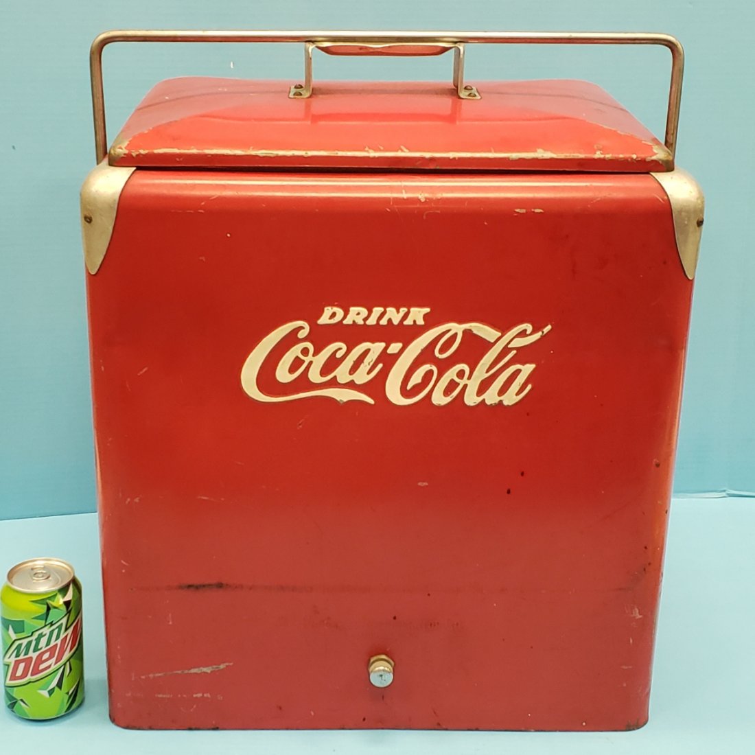 Coca Cola Embossed Picnic Cooler: 19" x 13" x 21"h Coca Cola cooler & tray embossed on 2 sides with scuffs and scratches. Made by Progress Refrigerator Company. PLEASE READ & UNDERSTAND THE PAYMENT & SHIPPING TERMS FOR THIS AUCTION PR
