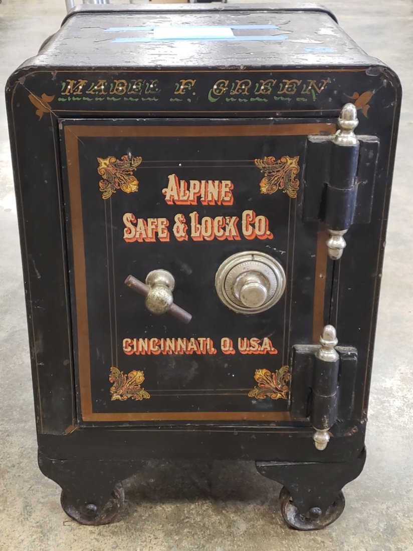 Small Antique Cast Iron Floor Safe with Combination: 17" x 15" x 23"h Alpine Safe & Lock Co. Cast iron safe in working condition. Normal wear with paint flakes. 22.5" x 28" Beautiful New Old Stock Laurens Girl calendar. PLEASE READ & UNDERSTAND THE PAYM