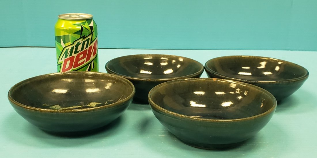 Scarce Reggie Meaders Set of 4 Bowls: 6"diameter four glazed bowls in excellent condition with signs of use. Uncommon to find. All signed on the bottom. PLEASE READ & UNDERSTAND THE PAYMENT & SHIPPING TERMS FOR THIS AUCTION PRIOR TO PLACI