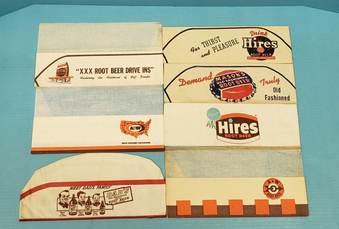 6 NOS Root Beer Soda Jerk Fountain Hats: 7 New old stock soda jerk hats made of paper and cloth including 2 Hires, 2 A&W, 1, Mason's, 1 Dad's, and 1 XXX Root Beer hat. All the hats are in excellent unused condition with bright graphics. PLEA