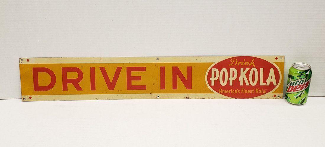 Pop Kola DRIVE IN Sign: 33" x 1.5" Hard to find tin embossed sign with scuff, scratches, and stains. PLEASE READ & UNDERSTAND THE PAYMENT & SHIPPING TERMS FOR THIS AUCTION PRIOR TO PLACING BIDS. ALL BIDDERS ARE BOUND TO THE