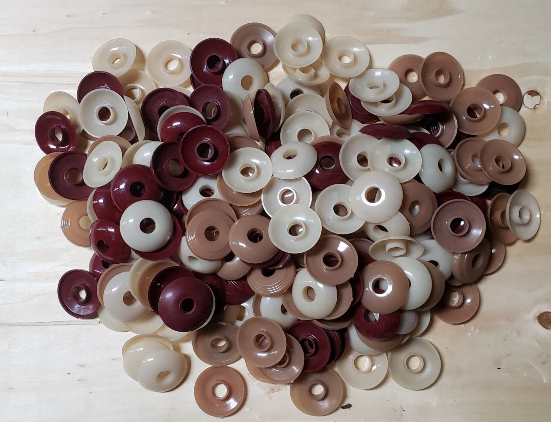Lot of plastic door & window handle escutcheons: Lot of original vintage parts.Please read and understand the terms of this auction prior to placing bids. All bidders are bound to the terms of this auction.
