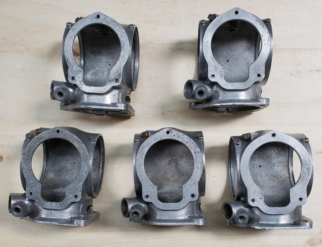 Lot of 5 Lincoln V12 distributor housings: Lot of original vintage parts. Please read and understand the terms of this auction prior to placing bids. All bidders are bound to the terms of this auction.
