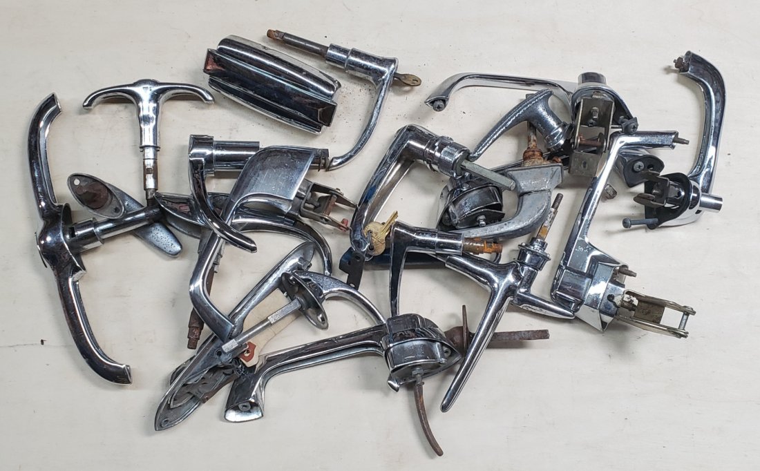 Mixed lot of New/Used exterior door handles: Lot of original vintage parts. Please read and understand the terms of this auction prior to placing bids. All bidders are bound to the terms of this auction.