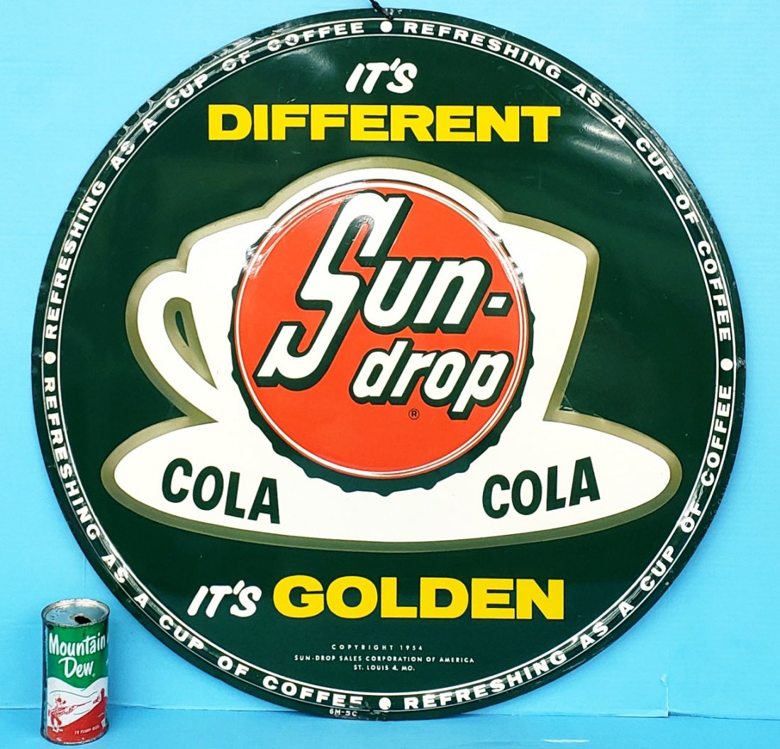 Sun Drop Golden Cola embossed round disc sign (1 of 3)