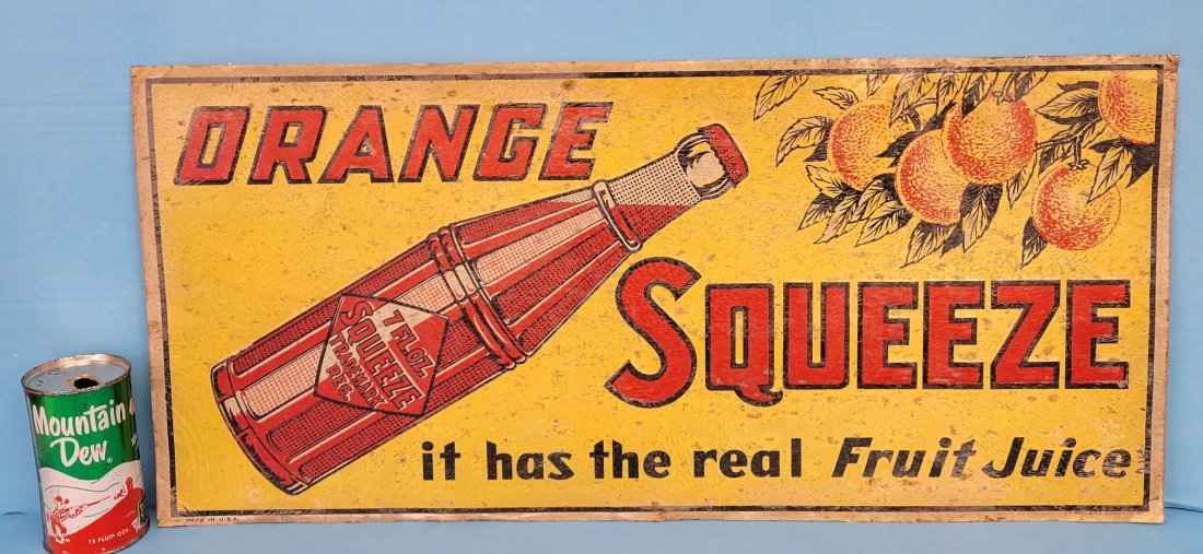 Orange Squeeze embossed tin sign (1 of 3)