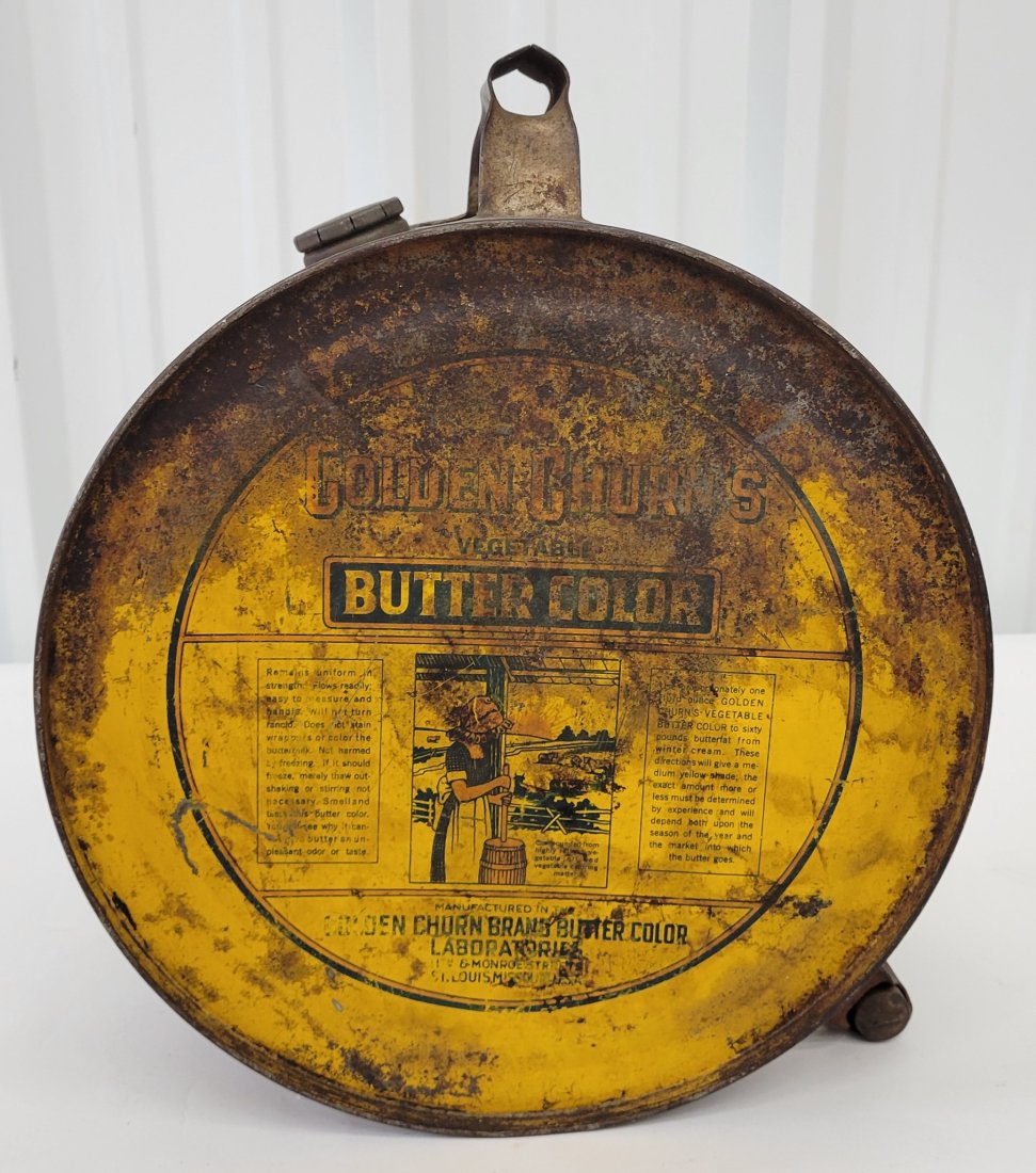 Golden Churn's Butter Color Rocker Can: 5 Gallon metal rocker can with lid. Shows scuffs, scratches, rust and paint flakes. PLEASE NOTE, THERE IS ONLY ONE WAY TO PAY FOR ONLINE ITEMS IN THIS AUCTION WHICH IS THROUGH LIVE AUCTIONEERS. THIS I
