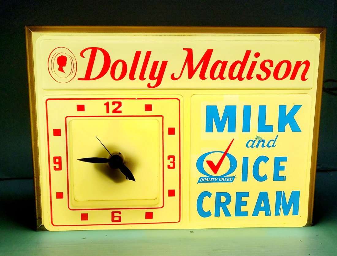 Dolly Madison Milk and Ice Cream Light Up Clock: 16" x 11" x 6" Working light up clock with plastic face and metal can with bright colors. Normal wear with scuffs, and the second hand sticks. *PLEASE NOTE, THERE IS ONLY ONE WAY TO PAY FOR ONLINE ITE